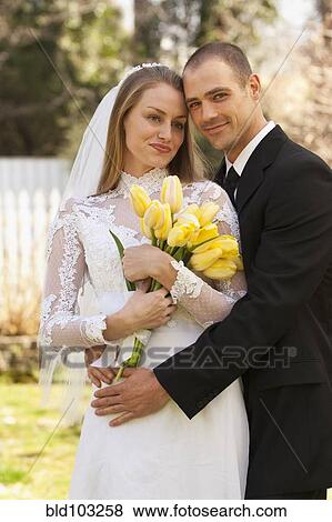 Stock Photo - Caucasian bride and groom. Fotosearch