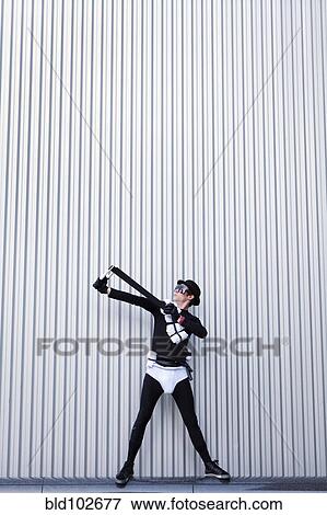 Caucasian man in superhero costume View Large Photo Image Stock Photo - Caucasian man in superhero costume. Fotosearch