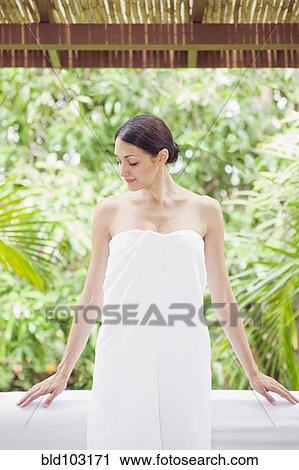 Caucasian woman in spa wrapped in a towel View Large Photo Image Stock Image - Caucasian woman in spa wrapped in a towel. Fotosearch