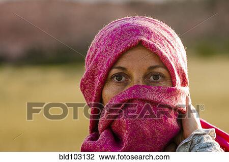 Caucasian woman with head wrapped in scarf View Large Photo Image Stock Image - Caucasian woman with head wrapped in scarf. Fotosearch