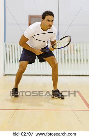 Hispanic man playing squash View Large Photo Image Stock Photo - Hispanic man playing squash. Fotosearch