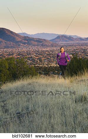 Hispanic woman running in remote area View Large Photo Image Stock Image - Hispanic woman running in remote area. Fotosearch