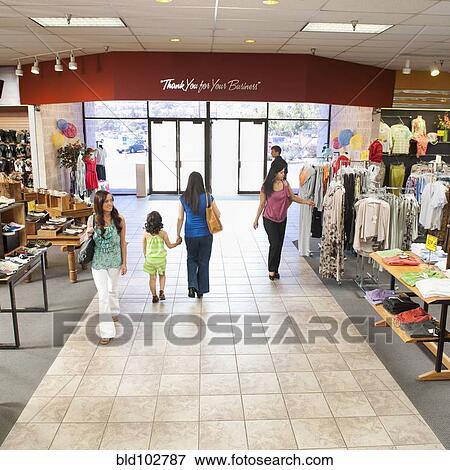 People shopping in clothing store View Large Photo Image Stock Photo - People shopping in clothing store. Fotosearch