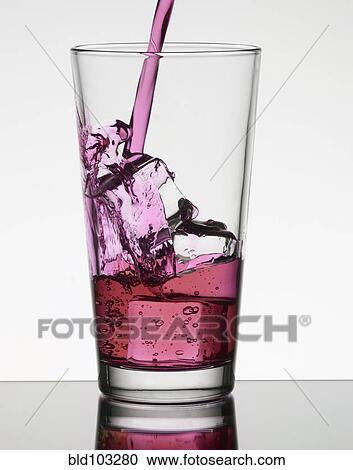Pink liquid filling glass with ice View Large Photo Image Stock Image - Pink liquid filling glass with ice. Fotosearch
