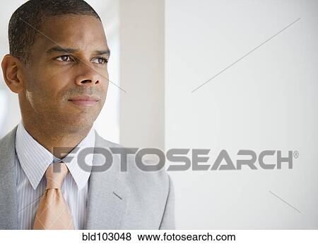 Serious mixed race businessman View Large Photo Image Stock Photo - Serious mixed race businessman. Fotosearch