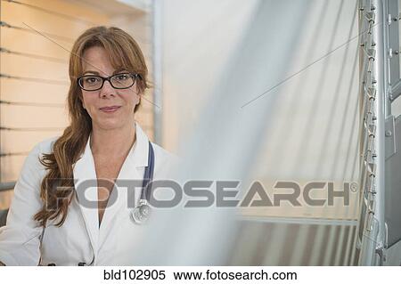 Stock Photography - Smiling Caucasian doctor. Fotosearch
