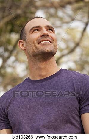 Stock Photograph - Smiling Caucasian man. Fotosearch