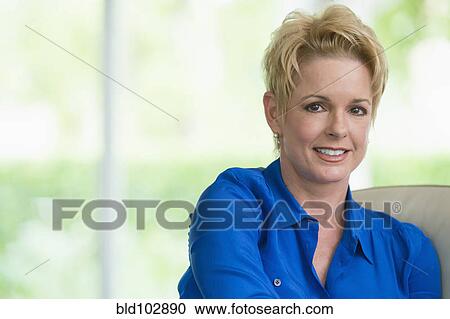 Stock Image - Smiling Caucasian woman. Fotosearch