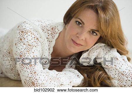 Stock Image - Smiling Hispanic woman. Fotosearch