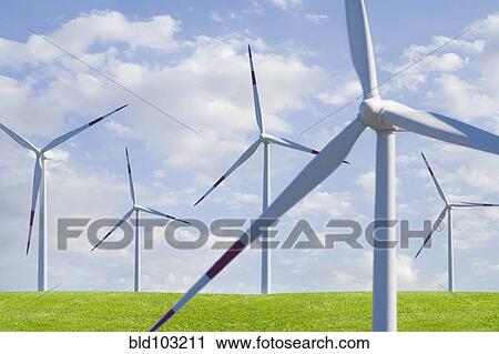 Wind farm in field View Large Photo Image Stock Image - Wind farm in field. Fotosearch
