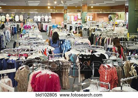 Women shopping in clothing store View Large Photo Image Stock Photography - Women shopping in clothing store. Fotosearch