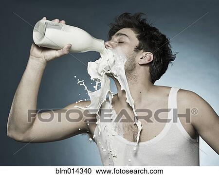 Caucasian man drinking milk and spilling it View Large Photo Image Stock Image - Caucasian man drinking milk and spilling it. Fotosearch
