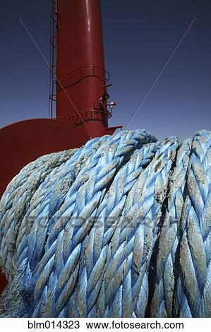 Stock Image - Close up of rope on ship. Fotosearch