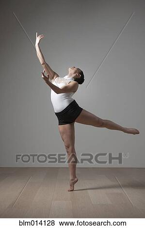 Graceful Caucasian ballet dancer View Large Photo Image Stock Photo - Graceful Caucasian ballet dancer. Fotosearch