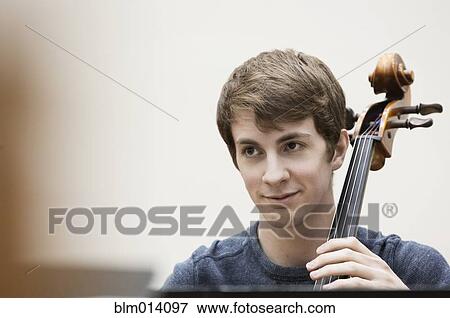 Man playing cello View Large Photo Image Stock Photo - Man playing cello. Fotosearch