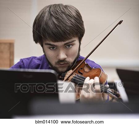 Stock Image - Musician playing violin. Fotosearch