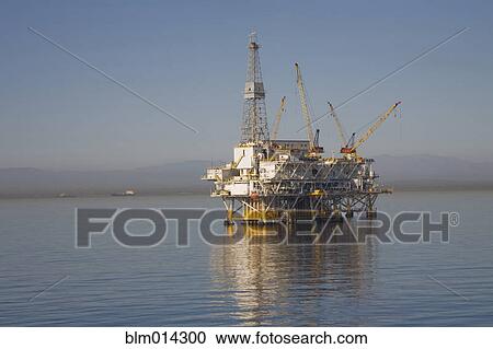 Stock Image - Oil rig on the ocean. Fotosearch
