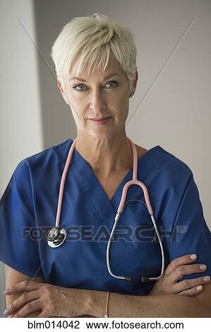 Stock Image - Serious Caucasian doctor. Fotosearch