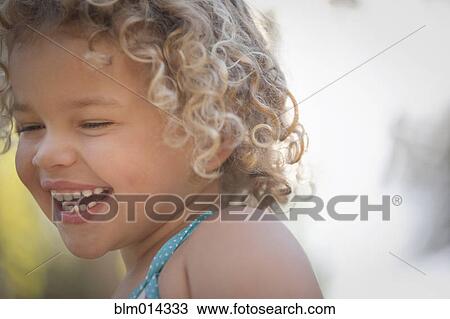 Stock Image - Smiling Caucasian girl. Fotosearch