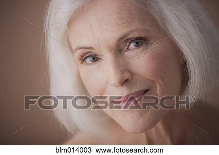 Stock Image - Smiling Caucasian woman. Fotosearch