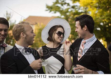 Smiling, elegant, Caucasian couple View Large Photo Image Stock Image - Smiling, elegant, Caucasian couple. Fotosearch