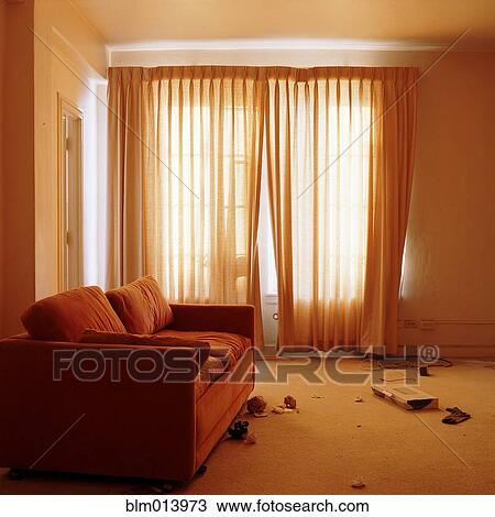 Sofa in messy living room View Large Photo Image Stock Image - Sofa in messy living room. Fotosearch