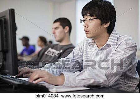 Picture - Students studying in computer lab. Fotosearch