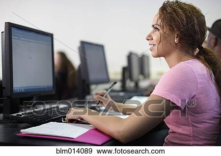 Students studying in computer lab View Large Photo Image Stock Photo - Students studying in computer lab. Fotosearch