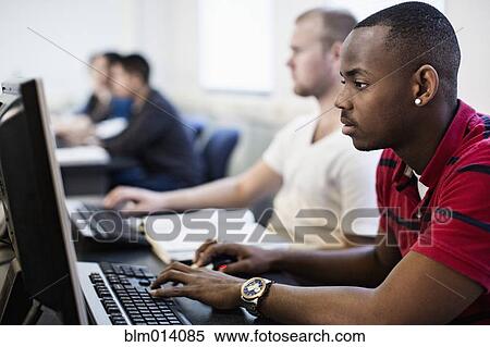 Stock Photography - Students studying in computer lab. Fotosearch