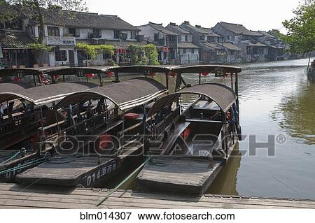 Traditional boat mooring at dock View Large Photo Image Stock Photo - Traditional boat mooring at dock. Fotosearch