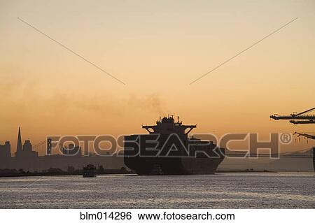 Tugboat and container ship in port of Oakland View Large Photo Image Stock Photograph - Tugboat and container ship in port of Oakland. Fotosearch