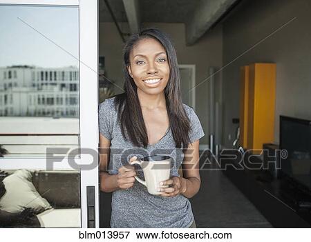 Woman drinking coffee View Large Photo Image Stock Photo - Woman drinking coffee. Fotosearch