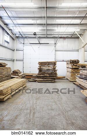 Wooden pallets in factory warehouse View Large Photo Image Stock Image - Wooden pallets in factory warehouse. Fotosearch