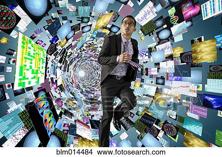 Picture - Asian businessman surrounded by science images. Fotosearch