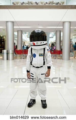 Boy in astronaut costume View Large Photo Image Stock Photo - Boy in astronaut costume. Fotosearch