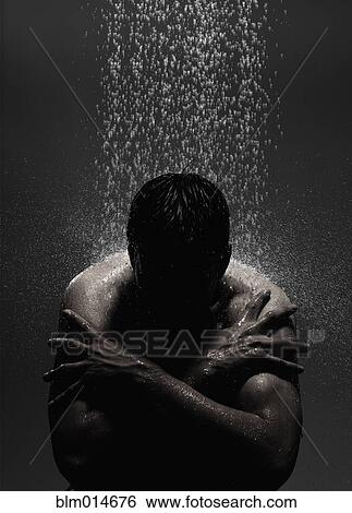 Caucasian man sitting in shower View Large Photo Image Stock Photograph - Caucasian man sitting in shower. Fotosearch