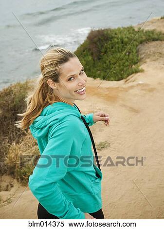 Caucasian woman running on beach View Large Photo Image Stock Photography - Caucasian woman running on beach. Fotosearch