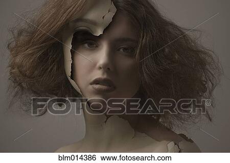 Caucasian woman with broken plastic skin View Large Photo Image Stock Photograph - Caucasian woman with broken plastic skin. Fotosearch