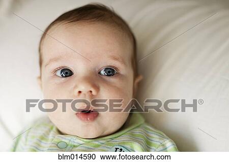 Stock Image - Curious Caucasian baby boy. Fotosearch