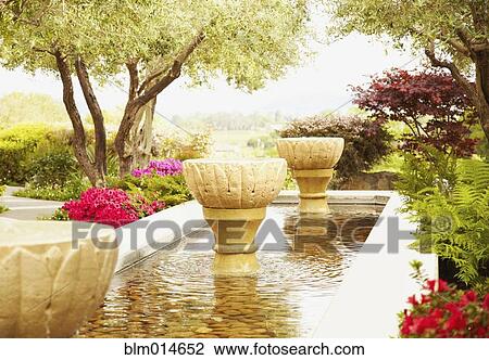 Fountain in formal garden View Large Photo Image Stock Image - Fountain in formal garden. Fotosearch