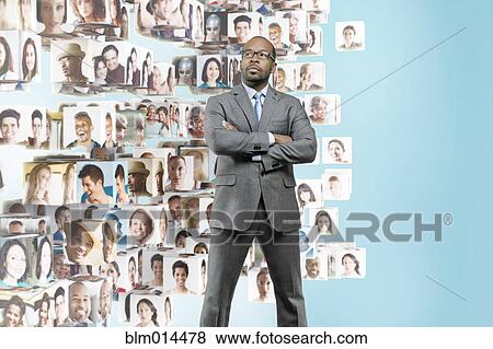 Images of business people behind African American businessman View Large Photo Image Stock Photo - Images of business people behind African American businessman. Fotosearch