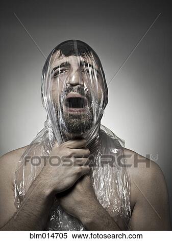 Man wrapped in plastic View Large Photo Image Stock Photography - Man wrapped in plastic. Fotosearch