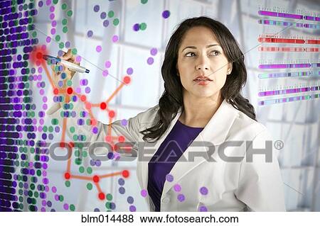 Mixed race scientist working with scientific images View Large Photo Image Stock Photo - Mixed race scientist working with scientific images. Fotosearch