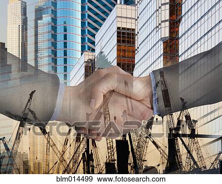 Montage of highrise buildings, cranes and businessmen shaking hands View Large Photo Image Stock Photo - Montage of highrise buildings, cranes and businessmen shaking hands. Fotosearch