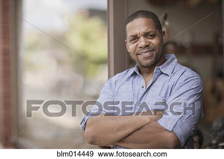 Native American man with arms crossed View Large Photo Image Stock Photo - Native American man with arms crossed. Fotosearch