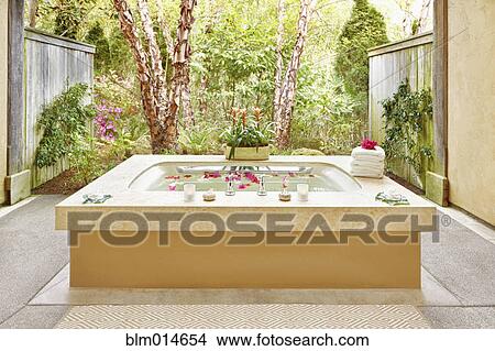 Picture - Outdoor bathtub at resort. Fotosearch
