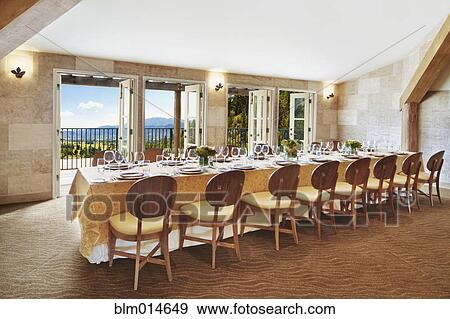 Stock Photo - Room with elegant table settings. Fotosearch