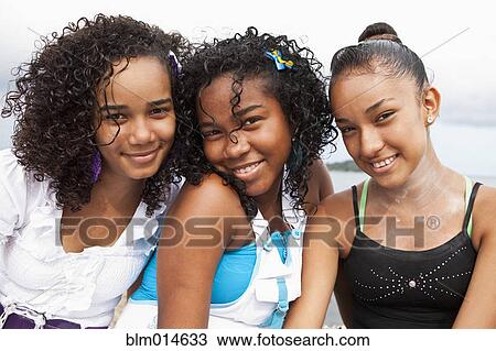 Smiling teenage friends View Large Photo Image Stock Image - Smiling teenage friends. Fotosearch
