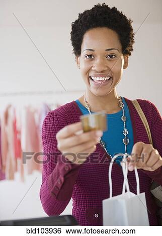 African American woman shopping with credit card View Large Photo Image Stock Photograph - African American woman shopping with credit card. Fotosearch