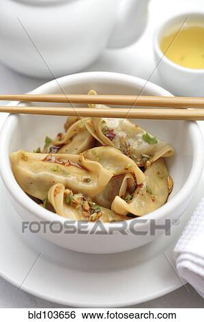 Stock Photograph - Asian dumplings in bowl. Fotosearch